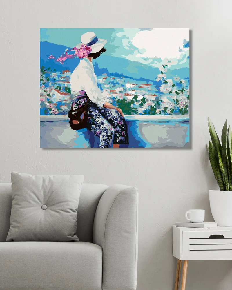 Diamond painting - SITZENDE FRAU AUF EINER MAUER